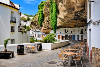 Calle Cuevas del Sol with houses built into the rocks