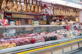 Jamon and cheese stalls in Alicante markets